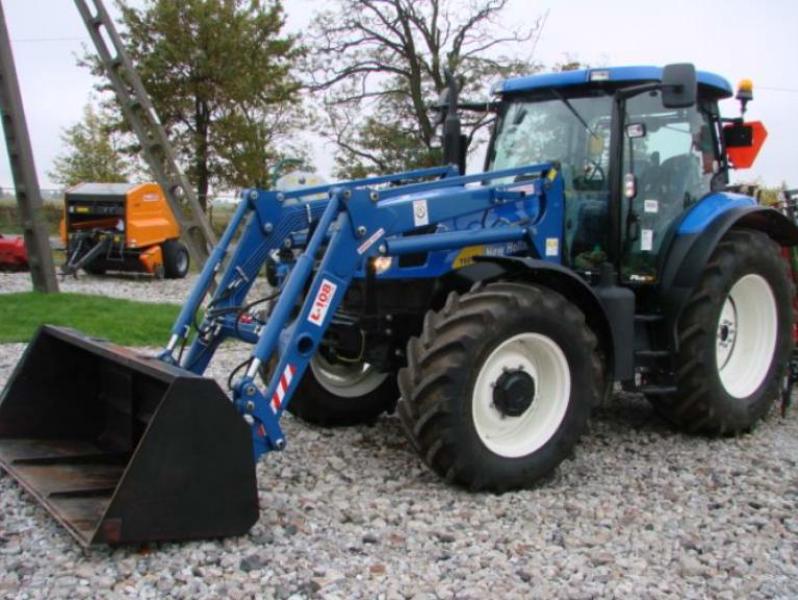 New Holland T6050 Plus  Ciągnik rolniczy z ładowaczem kupisz używany(ą) (Trading Premium) | NetBid Polska